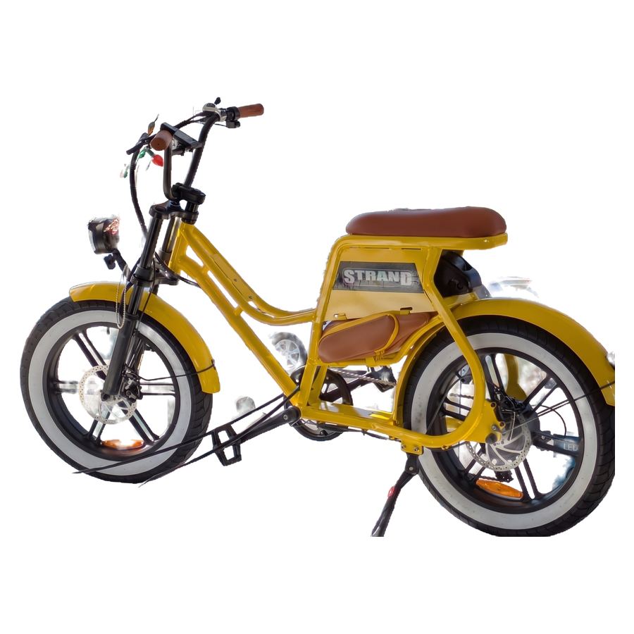 A yellow Strand moto-style e-bike, isolated on the page.