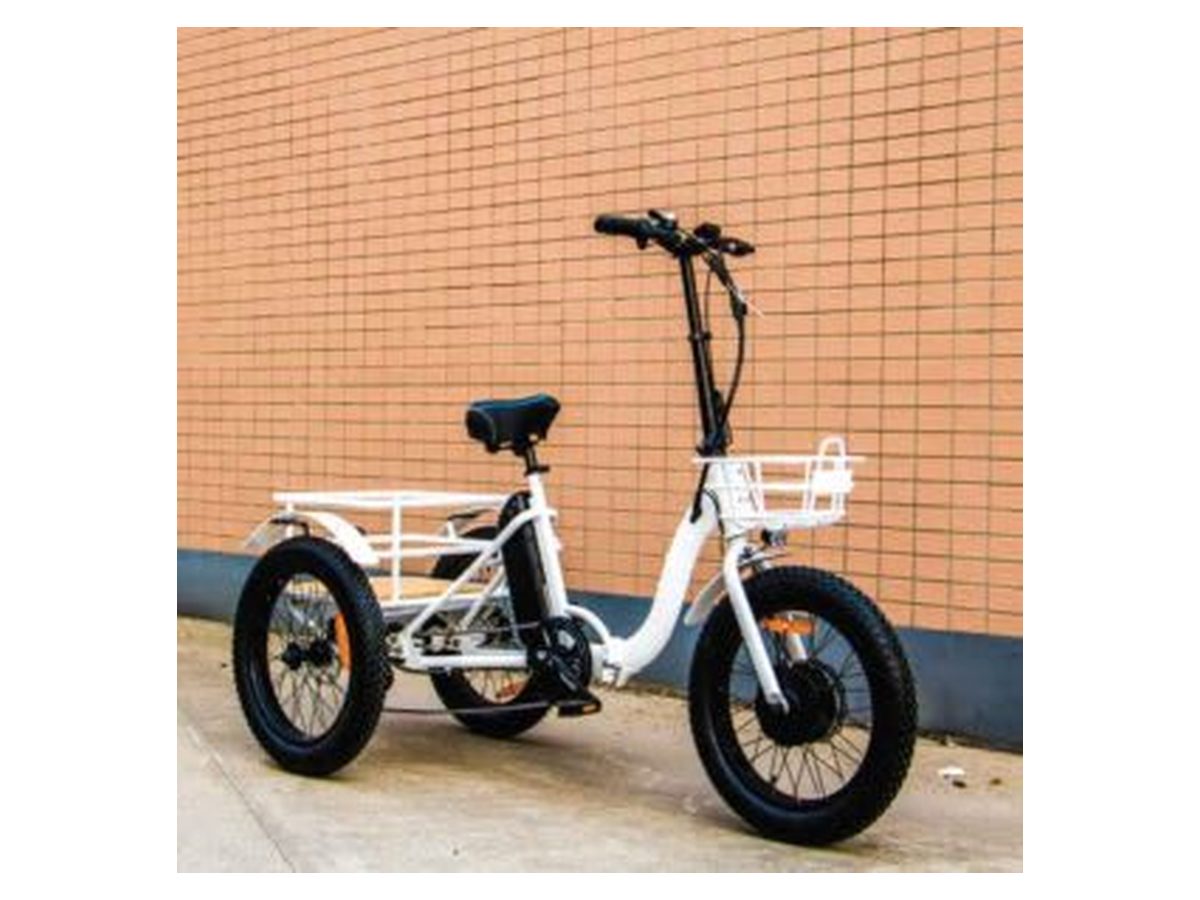 A white Strand eTrike with a front basket and rear cargo box.